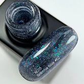 NAILSOFTHENIGHT 02  base reflectante de camuflaje con brillo (destellos azules y celestes) 10 ml